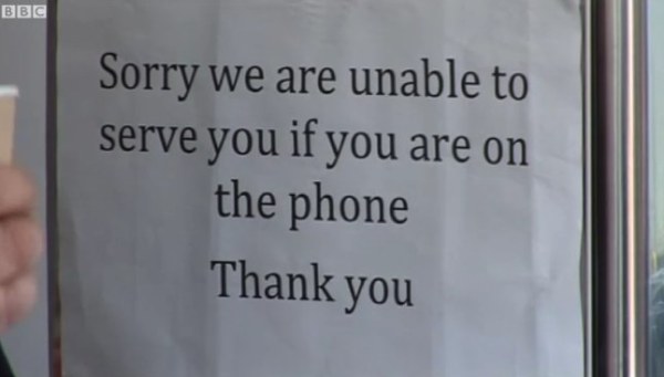 "sorry we are unable to serve you if you are on the phone"